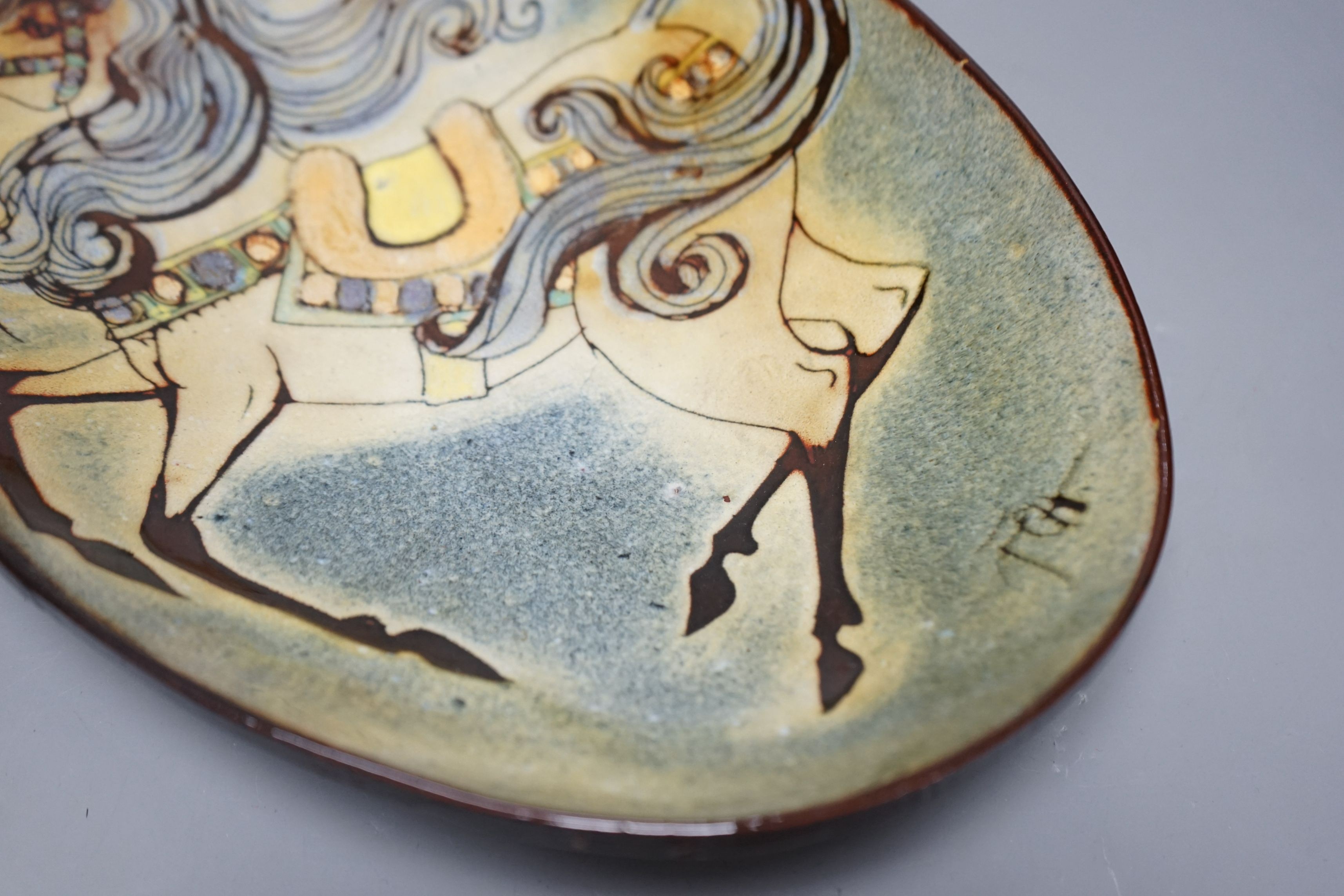 A Chelsea pottery polychrome oval dish by Joyce Morgan, 39cms long